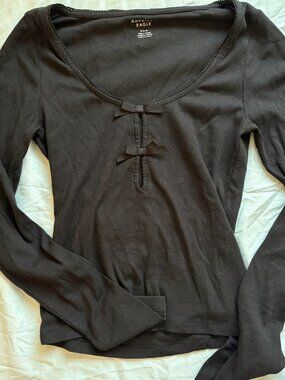 Black American eagle long sleeve top with bows never...